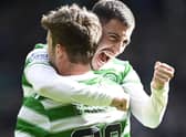 Substitute Matt O'Riley (L) celebrates making it 6-0 with Josip Juranovic. (Photo by Rob Casey / SNS Group)