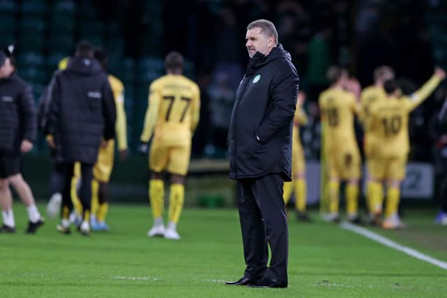 Celtic manager Ange Postecoglou is left dejected as Bodo/Glimt celebrate their Europa Conference League first leg win at Celtic Park last week. (Photo by Craig Williamson / SNS Group)