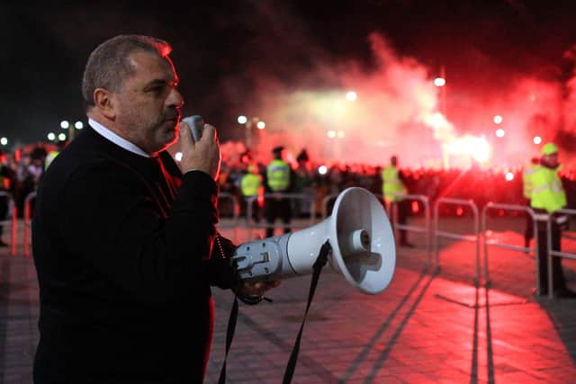 Ange Posetcoglou addresses celebrating Celtic fans with a megaphone outside Celtic Park. (Photo by Ewan Bootman / SNS Group)