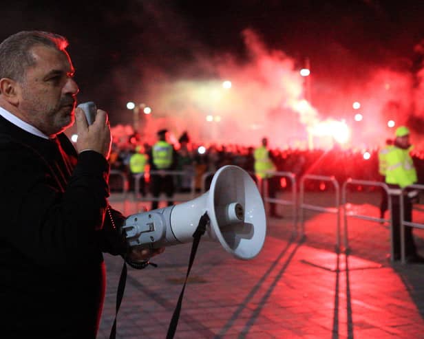 Ange Posetcoglou addresses celebrating Celtic fans with a megaphone outside Celtic Park. (Photo by Ewan Bootman / SNS Group)