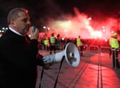 Ange Posetcoglou addresses celebrating Celtic fans with a megaphone outside Celtic Park. (Photo by Ewan Bootman / SNS Group)