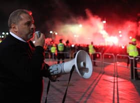 Ange Posetcoglou addresses celebrating Celtic fans with a megaphone outside Celtic Park. (Photo by Ewan Bootman / SNS Group)