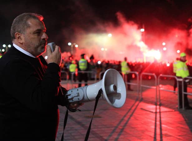 <p>Ange Posetcoglou addresses celebrating Celtic fans with a megaphone outside Celtic Park. (Photo by Ewan Bootman / SNS Group)</p>