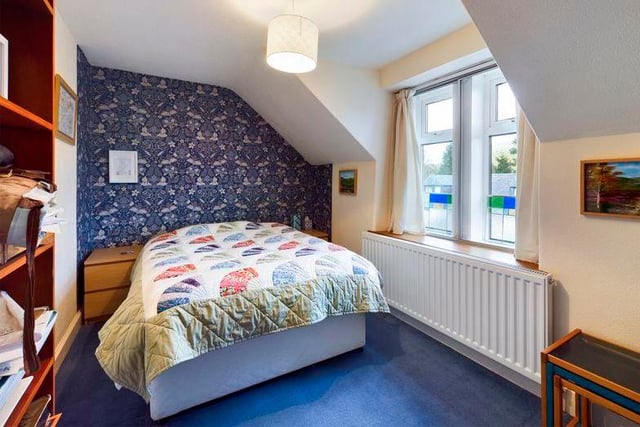 Another spacious bedroom, ideal for extended family or guests.