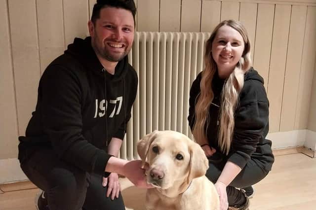 Guide Dog Autumn with Alistair Morton (Kyle) and Vikki McIntyre (Paulette).
