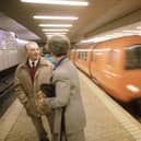 A couple chatting in Buchanan Street underground station in Glasgow as the train comes in, August 1990.