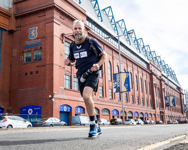 David Smith sets off from Ibrox Stadium to start his 21-day challenge