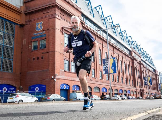 David Smith sets off from Ibrox Stadium to start his 21-day challenge