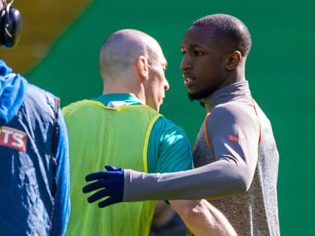 Celtic captain Scott Brown embraces Rangers' Glen Kamara prior to the Old Firm fixture in March. (Photo by Craig Williamson / SNS Group)