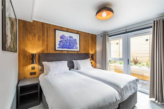 One of the lodge bedrooms with king-size bed. Image: Tony Trasmundi