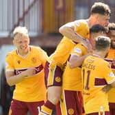 Kaiyne Woolery celebrating scoring Motherwell's third goal against Queen of the South (Picture by Ian McFadyen)