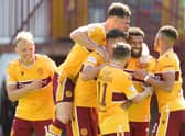 Kaiyne Woolery celebrating scoring Motherwell's third goal against Queen of the South (Picture by Ian McFadyen)