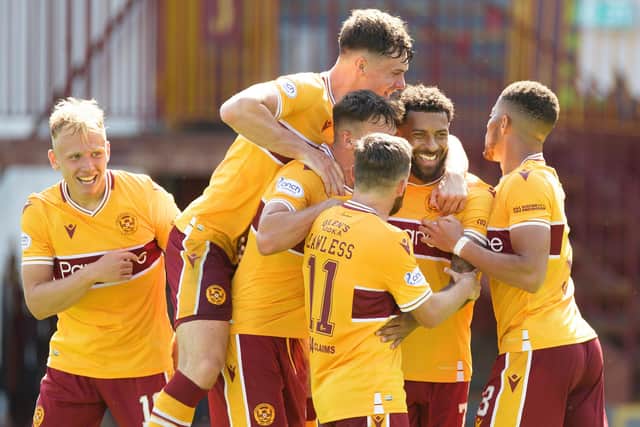 Kaiyne Woolery celebrating scoring Motherwell's third goal against Queen of the South (Picture by Ian McFadyen)