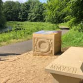 STUNNING: The installation on the canal towpath comprises of a stone bench, replica carvings, stone cairns, and interpretation panels