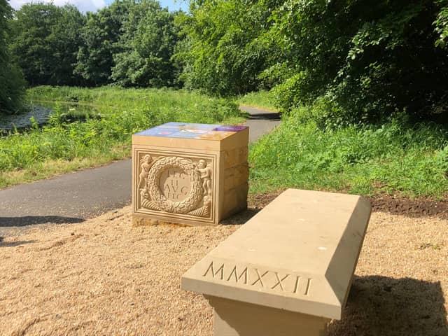 STUNNING: The installation on the canal towpath comprises of a stone bench, replica carvings, stone cairns, and interpretation panels