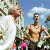 A street entertainer juggling in Argyle Street on a sunny Glasgow day in June 1992.