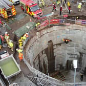 The hands-on training involved the recovery of an injured person from the bottom of the storm tank, using ropes.