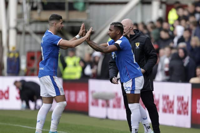 Rangers manager Giovanni van Bronckhorst faces a dilemma over whether to start Antonio Colak (left) or Alfredo Morelos at Anfield.