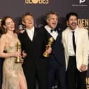 (L-R) Yorgos Lanthimos, Emma Stone, Willem Dafoe, Mark Ruffalo, and Ramy Youssef, winners of the Best Picture, Musical or Comedy award for "Poor Things" pose in the press room during the 81st Annual Golden Globe Awards at The Beverly Hilton. Picture: Amy Sussman/Getty Images