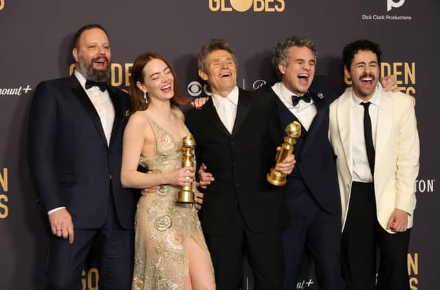 (L-R) Yorgos Lanthimos, Emma Stone, Willem Dafoe, Mark Ruffalo, and Ramy Youssef, winners of the Best Picture, Musical or Comedy award for "Poor Things" pose in the press room during the 81st Annual Golden Globe Awards at The Beverly Hilton. Picture: Amy Sussman/Getty Images