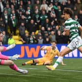 Celtic's Jota scores to make it 3-0 against Livingston on Sunday.