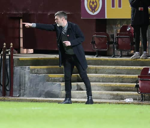 Motherwell boss Graham Alexander directs his troops against Morton (Pic by Ian McFadyen)