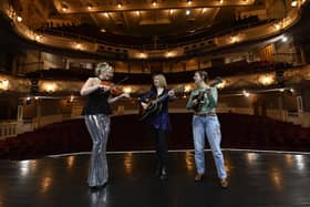 Aileen Reid, Jenn Butterworth and Laura Beth Salter of Scottish folk powerhouse Kinnaris Quintet launch the programme for the 2024 Celtic Connections festival in Glasgow at the Pavilion Theatre. Picture: Rob Casey/SNS Group