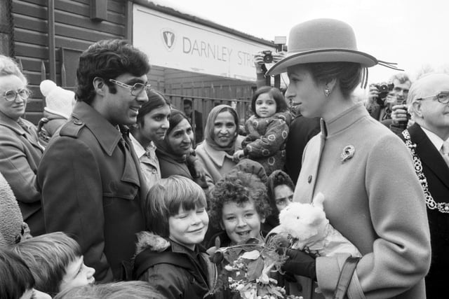 Princess Anne chats to people outside the Darnley Street nursery during her visit to Glasgow in March 1979.