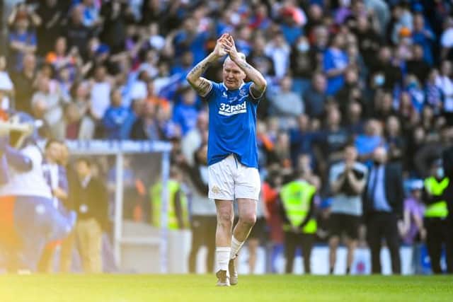 Paul Gascoigne salutes the crowd as he makes a late substitute appearance for the Rangers Legends side against a World Legends XI at Ibrox on Saturday. (Photo by Rob Casey / SNS Group)