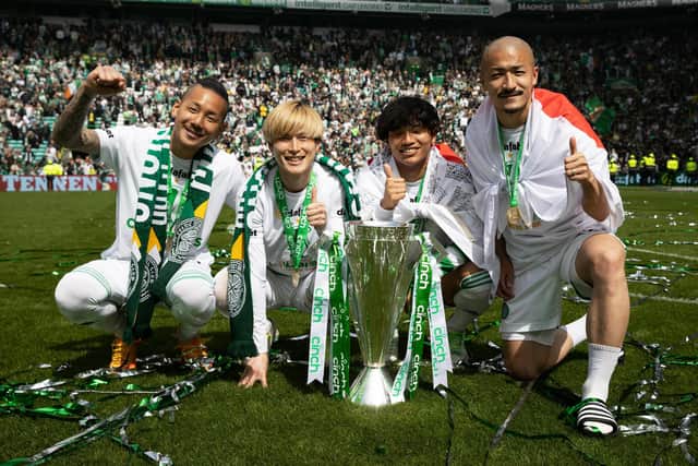 Celtic's Japanese quartet (from left) Yosuke Ideguchi, Kyogo Furuhashi, Reo Hatate and Daizen Maeda with the Premiership trophy. (Photo by Craig Williamson / SNS Group)