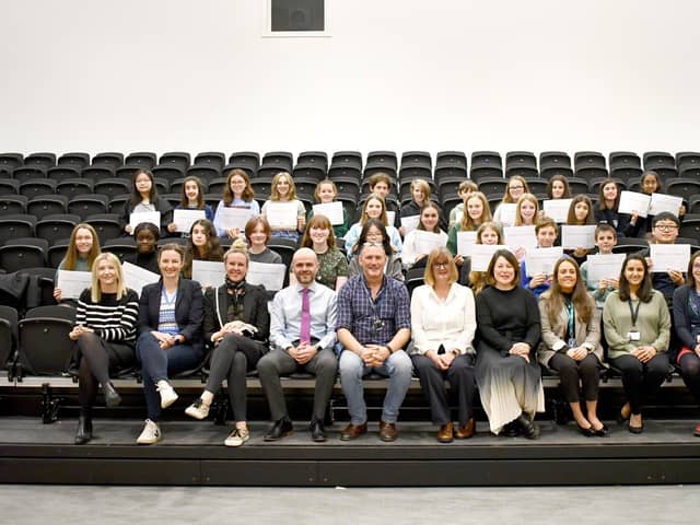 S2 pupils who completed Women in Property outreach programme with representatives from the Association of Women in Property and Contractor McLaughlin & Harvey, officers from the Council's Major Assets team, teachers, Head Teacher Barry Smedley and Councillor Lynda Williamson, Convener of Education