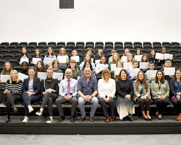 S2 pupils who completed Women in Property outreach programme with representatives from the Association of Women in Property and Contractor McLaughlin & Harvey, officers from the Council's Major Assets team, teachers, Head Teacher Barry Smedley and Councillor Lynda Williamson, Convener of Education