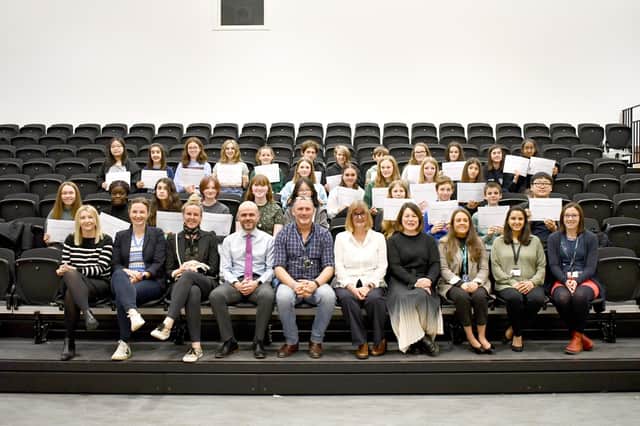 S2 pupils who completed Women in Property outreach programme with representatives from the Association of Women in Property and Contractor McLaughlin & Harvey, officers from the Council's Major Assets team, teachers, Head Teacher Barry Smedley and Councillor Lynda Williamson, Convener of Education