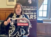 Kirsten Oswald with a PETA ‘MOD Go fur free’ poster