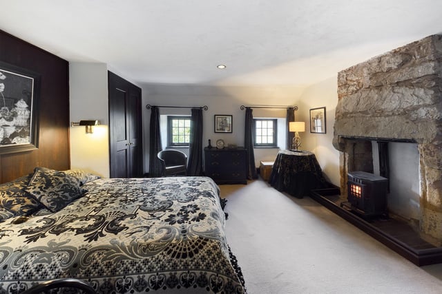 Another beautiful fireplace in this spacious double bedroom shows the property's heritage. If only it could talk...
