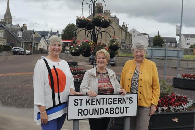The grand reveal by (l-r) Councillor Catherine McClymont, Elanor McLean and LCDT chairwoman Sylvia Russell.