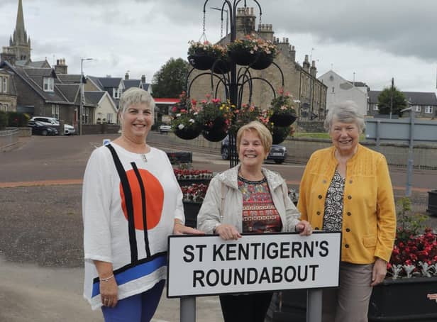 The grand reveal by (l-r) Councillor Catherine McClymont, Elanor McLean and LCDT chairwoman Sylvia Russell.