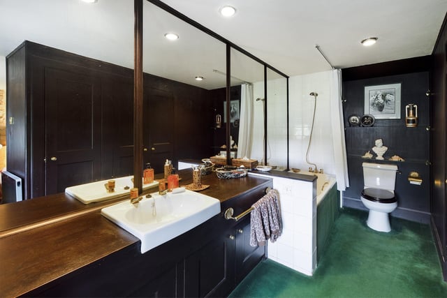 The master bedroom has its own en-suite bathroom and dressing room.