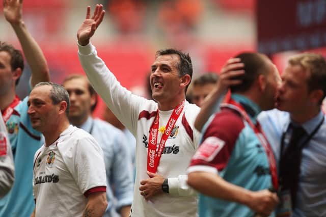 LONDON - MAY 25: Burnley Manager Owen Coyle celebrates victory during the Coca-Cola Championship Playoff Final between Burnley and Sheffield United at Wembley Stadium on May 25, 2009 in London, England.