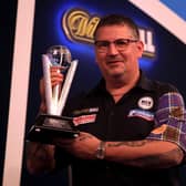 Gary Anderson with his runners up trophy after losing the final against Gerwyn Price at the World Darts Championship.