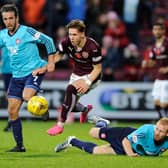 Dougie Imrie (1st left) in action for Hamilton Accies against Hearts (Pic by Neil Hanna)
