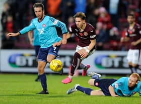 Dougie Imrie (1st left) in action for Hamilton Accies against Hearts (Pic by Neil Hanna)