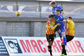Peterhead's Jason Brown comes close with a header against Partick Thistle (pic: Duncan Brown)