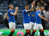 Rangers players applaud their fans after a disappointing night against Lyon on Matchday One. Picture: SNS