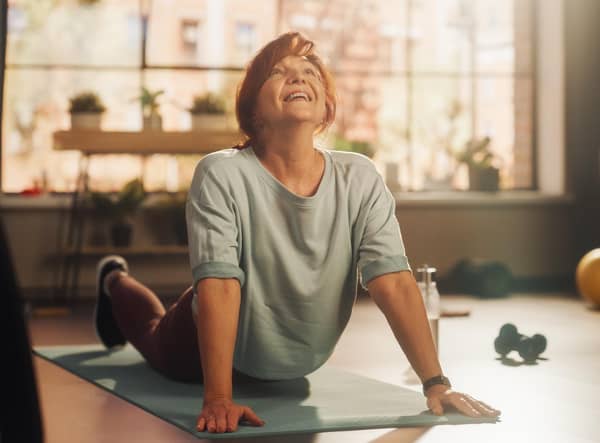 Working out at home can save both time and money (photo: Adobe)
