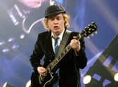 Rock giants AC/DC may have formed in Australia, but their Scottish lineage is clear. Founding members Angus (pictured) and Malcolm Young. were born in Glasgow, while former front man Bon Scott, who died in 1980, was born in Kirriemuir.