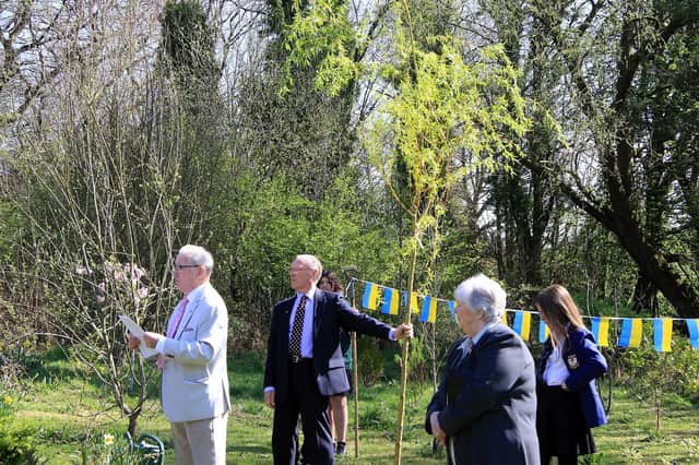 Bobby Johnson welcomed the crowds and spelled out exactly why the tree was being planted