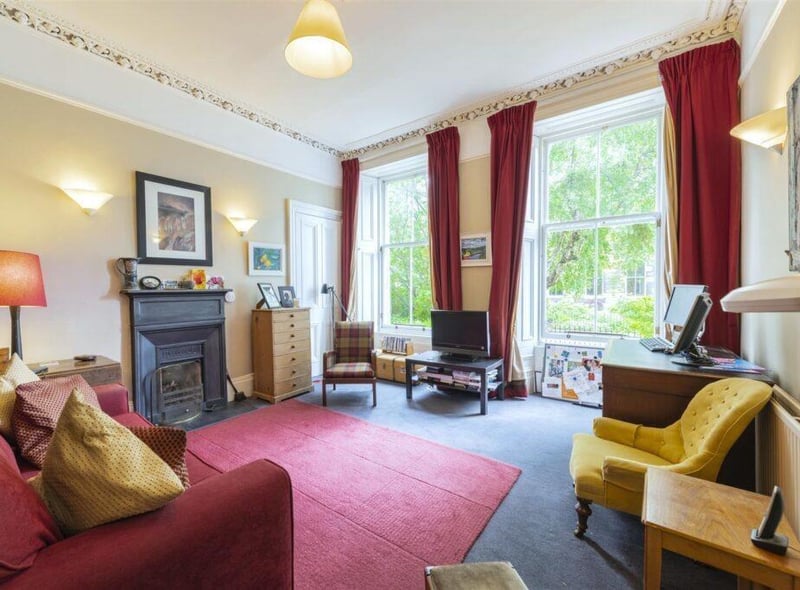 The lounge on the ground floor with the feature fireplace.