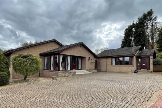 This individually designed split-level villa is set amidst four acres of garden grounds, with beautiful countryside views.