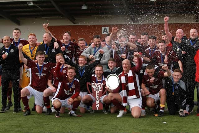 Petershill celebrate their dramatic WoSFL Conference C title win (pic: @roguemonkeydm / WoSFL)